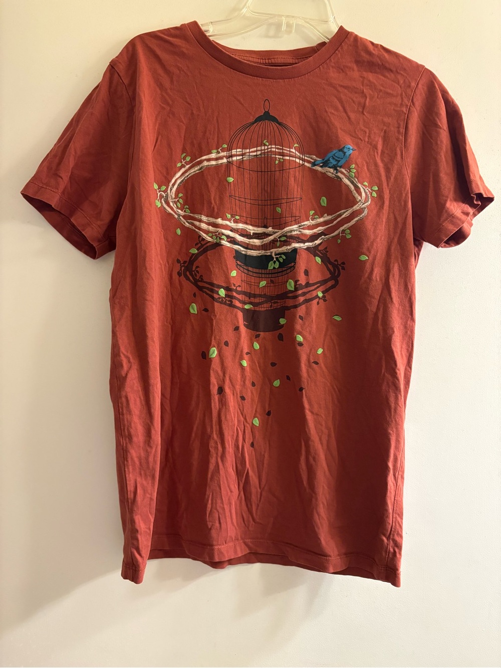 KAFT.com Rust Orange Graphic Tee with Bird Cage Design